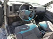 ✅ 1993 Nissan Frontier SE • VIN: 1N6HD16Y9PC430786 • Лот: 56333545. Опубликован ранее на Copart с пробегом 262 505 миль. Бесплатный доступ к архиву аукционных продаж из США и подробный отчёт об истории автомобиля на DreamBid. Изображение 8.