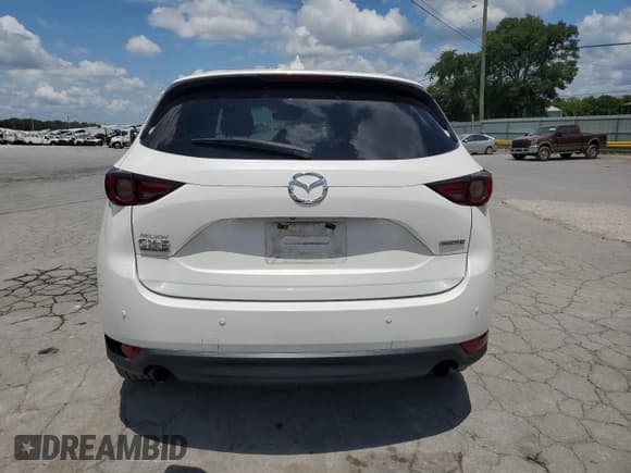 ✅ 2020 Mazda CX-5 Signature • VIN: JM3KFBEY8L0746466 • Лот: 66280825. Опубликован ранее на Copart с пробегом 91 011 миль. Бесплатный доступ к архиву аукционных продаж из США и подробный отчёт об истории автомобиля на DreamBid. Изображение 6.
