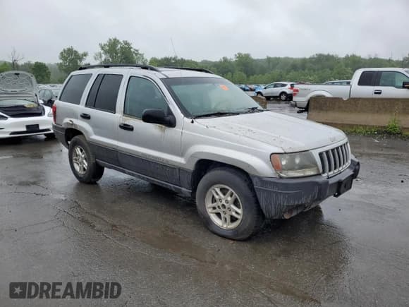 ✅ 2004 Jeep Grand Cherokee Laredo • VIN: 1J4GW48S74C288625 • Lot: 61290805. Listed on Copart with 194,615 mi. Free auction sales archive from the USA and detailed vehicle history report at DreamBid. Image 4.