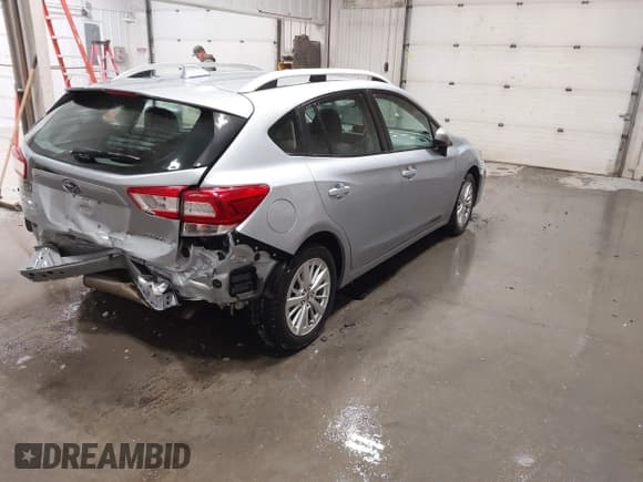 ✅ 2018 Subaru Impreza Premium • VIN: 4S3GTAB63J3728036 • Lot: 43662045. Listed on IAAI with 70,151 mi. Free auction sales archive from the USA and detailed vehicle history report at DreamBid. Image 4.