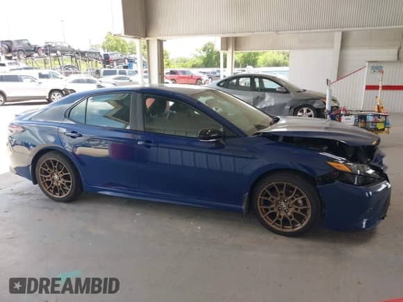 2023 Toyota Camry SE with VIN 4T1G11BK9PU091896, listed as a IAAI auction lot 42505987 with 75,683 mi miles and . Bid and sale history available at DreamBid. Image 13.