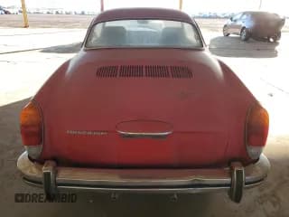 ✅ 1973 Volkswagen Karmann Ghia • VIN: 1432621500 • Lot: 79897094. Wystawiony na Copart z przebiegiem 21 352 mil. Bezpłatny archiwum sprzedaży aukcyjnych z USA i szczegółowy raport historii pojazdu na DreamBid. Zdjęcie 6.