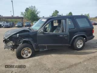 1996 Ford Explorer Eddie Bauer z VIN 1FMCU22X6TUB13953, wystawiony jako Copart lot #57425965 z przebiegiem 296 836 mil mil oraz Szkoda całkowita • Salvage title. Historia ofert i sprzedaży dostępna na DreamBid. Obrazek 1.