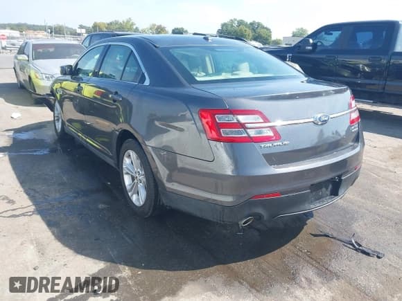 ✅ 2015 Ford Taurus SEL • VIN: 1FAHP2E88FG179306 • Лот: 43262362. Опубликован ранее на IAAI с пробегом 124 164 миль. Бесплатный доступ к архиву аукционных продаж из США и подробный отчёт об истории автомобиля на DreamBid. Изображение 3.