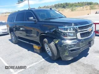 ✅ 2020 Chevrolet Suburban LT • VIN: 1GNSKHKC2LR248296 • Lot: 43022550. Listed on IAAI with 185,710 mi. Free auction sales archive from the USA and detailed vehicle history report at DreamBid. Image 1.