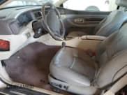 ✅ 1997 Lincoln Mark VIII • VIN: 1LNLM91V3VY602590 • Lot: 44431555. Listed on Copart with 157,445 mi. Free auction sales archive from the USA and detailed vehicle history report at DreamBid. Image 7.