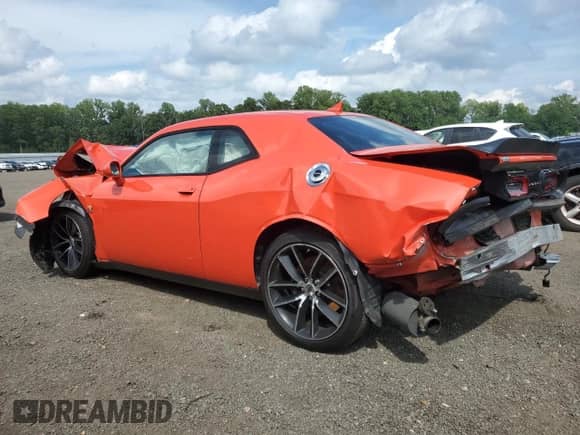 2018 Dodge Challenger T/A 392 with VIN 2C3CDZFJ8JH327379, listed as a Copart auction lot 65124915 with 98,259 mi miles and Salvage title. Bid and sale history available at DreamBid. Image 2.