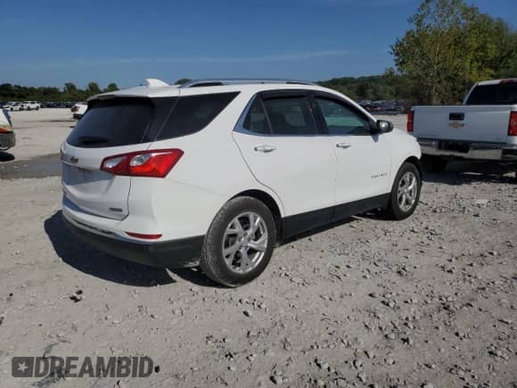2018 Chevrolet Equinox Premier с VIN 3GNAXPEU1JL164020, выставлен на аукционе Copart как лот 84580105 с пробегом 52 219 миль миль и Списание • Salvage title. История ставок и продаж доступна на DreamBid. Изображение 3.