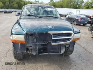 1999 Dodge Dakota SLT z VIN 1B7GG22Y1XS285749, wystawiony jako Copart lot #73038674 z przebiegiem 153 048 mil mil oraz Szkoda całkowita • Salvage title. Historia ofert i sprzedaży dostępna na DreamBid. Obrazek 5.