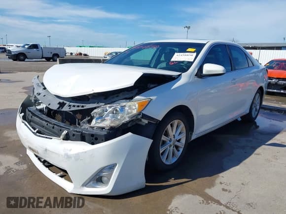 ✅ 2014 Toyota Camry SE • VIN: 4T1BK1FK3EU550936 • Lot: 42458850. Listed on IAAI with 182,073 mi. Free auction sales archive from the USA and detailed vehicle history report at DreamBid. Image 2.