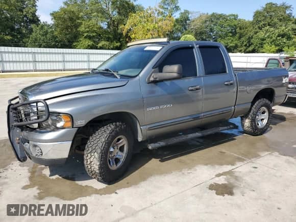 2005 Dodge 1500 SLT с VIN 1D7HU18D25J617265, выставлен на аукционе Copart как лот 68610104 с пробегом 183 956 миль миль и Списание • Salvage title. История ставок и продаж доступна на DreamBid. Изображение 1.