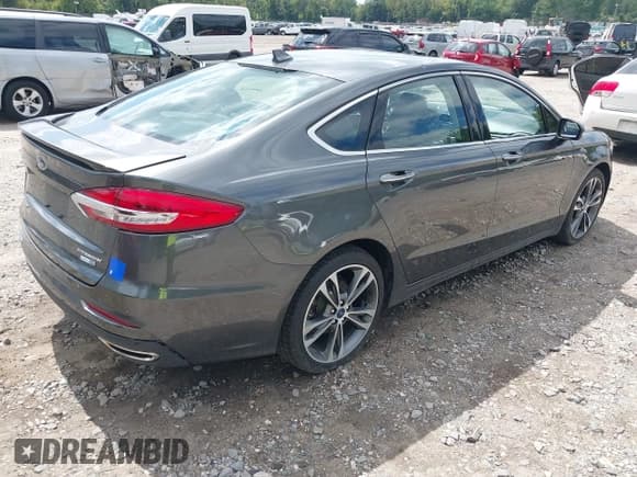 ✅ 2020 Ford Fusion Titanium • VIN: 3FA6P0D97LR116854 • Lot: 43081513. Listed on IAAI with 97,625 mi. Free auction sales archive from the USA and detailed vehicle history report at DreamBid. Image 4.