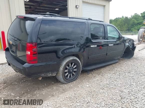 2014 Chevrolet Suburban LT z VIN 1GNSCJE07ER219935, wystawiony jako IAAI lot #42286843 z przebiegiem 175 459 mil mil oraz . Historia ofert i sprzedaży dostępna na DreamBid. Obrazek 4.
