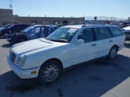 ✅ 1998 Mercedes-Benz E 320 • VIN: WDBJH82F7WX011301 • Lot: 42553889. Listed on IAAI with 226,562 mi. Free auction sales archive from the USA and detailed vehicle history report at DreamBid. Image 2.