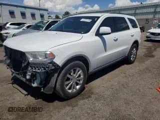 2016 Dodge Durango SXT with VIN 1C4RDHAG7GC455605, listed as a Copart auction lot 67291185 with 124,479 mi miles and Salvage title. Bid and sale history available at DreamBid. Image 1.