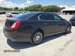 ✅ 2013 Lincoln MKS • VIN: 1LNHL9DK0DG615859 • Lot: 66994754. Listed on Copart with 105,133 mi. Free auction sales archive from the USA and detailed vehicle history report at DreamBid. Image 3.