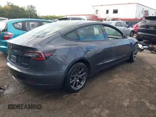 ✅ 2022 Tesla Model 3 Long Range • VIN: 5YJ3E1EB3NF157111 • Lot: 43083104. Listed on IAAI with Not provided. Free auction sales archive from the USA and detailed vehicle history report at DreamBid. Image 4.