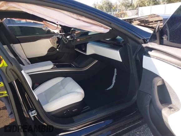 ✅ 2024 Tesla Model S Plaid • VIN: 5YJSA1E64RF533525 • Lot: 42922540. Listed on IAAI with Not provided. Free auction sales archive from the USA and detailed vehicle history report at DreamBid. Image 5.