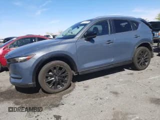 ✅ 2021 Mazda CX-5 Carbon Edition • VIN: JM3KFACY8M0348477 • Lot: 58185755. Listed on Copart with 85,864 mi. Free auction sales archive from the USA and detailed vehicle history report at DreamBid. Image 1.