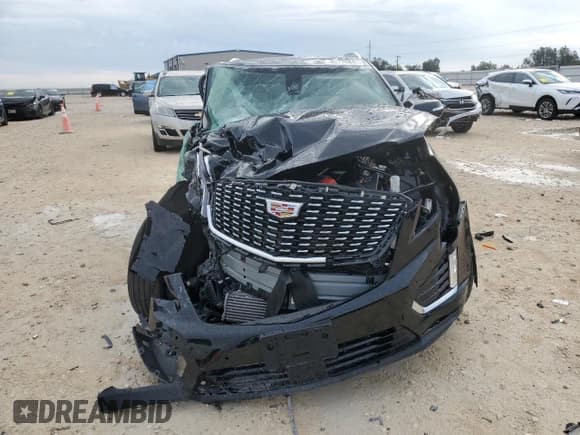 ✅ 2024 Cadillac XT5 FWD Premium Luxury • VIN: 1GYKNCR44RZ757102 • Lot: 82776845. Wystawiony na Copart z przebiegiem 21 895 mil. Bezpłatny archiwum sprzedaży aukcyjnych z USA i szczegółowy raport historii pojazdu na DreamBid. Zdjęcie 5.