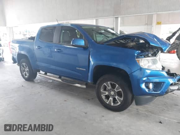 2018 Chevrolet Colorado 4WD Z71 z VIN 1GCGTDENXJ1155801, wystawiony jako IAAI lot #43394572 z przebiegiem 75 912 mil mil oraz . Historia ofert i sprzedaży dostępna na DreamBid. Obrazek 1.