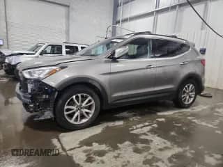 2016 Hyundai Santa Fe z VIN 5XYZUDLA2GG306094, wystawiony jako Copart lot #71883815 z przebiegiem 110 452 mil mil oraz Szkoda całkowita • Salvage title. Historia ofert i sprzedaży dostępna na DreamBid. Obrazek 1.
