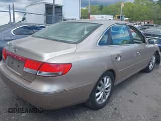 2006 Hyundai Azera SE с VIN KMHFC46FX6A125848, выставлен на аукционе IAAI как лот 42195041 с пробегом 147 596 миль миль и . История ставок и продаж доступна на DreamBid. Изображение 4.