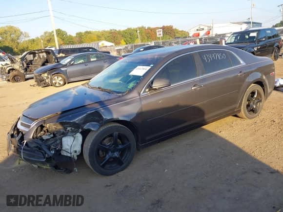 2012 Chevrolet Malibu 1LS with VIN 1G1ZB5E03CF274794, listed as a IAAI auction lot 43447850 with 126,894 mi miles and . Bid and sale history available at DreamBid. Image 2.