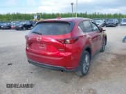 ✅ 2021 Mazda CX-5 Grand Touring • VIN: JM3KFBDM7M0357057 • Лот: 43110761. Опубликован ранее на IAAI с пробегом 66 576 миль. Бесплатный доступ к архиву аукционных продаж из США и подробный отчёт об истории автомобиля на DreamBid. Изображение 4.