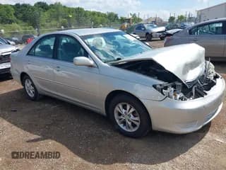 ✅ 2005 Toyota Camry LE • VIN: 4T1BF30K95U590298 • Lot: 42858652. Listed on IAAI with 166,683 mi. Free auction sales archive from the USA and detailed vehicle history report at DreamBid. Image 1.