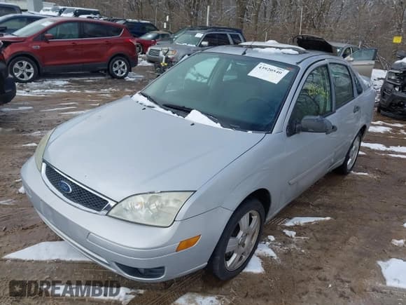 ✅ 2007 Ford Focus S • VIN: 1FAHP34N07W201254 • Лот: 43920540. Опубликован ранее на IAAI с пробегом 136 000 миль. Бесплатный доступ к архиву аукционных продаж из США и подробный отчёт об истории автомобиля на DreamBid. Изображение 2.