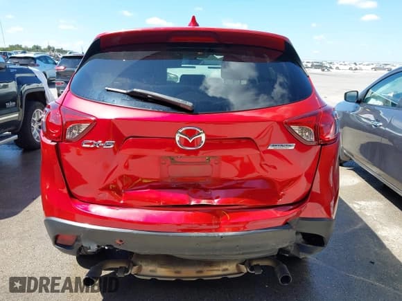 ✅ 2015 Mazda CX-5 Touring • VIN: JM3KE2CY2F0510101 • Lot: 43273950. Listed on IAAI with 128,283 mi. Free auction sales archive from the USA and detailed vehicle history report at DreamBid. Image 16.