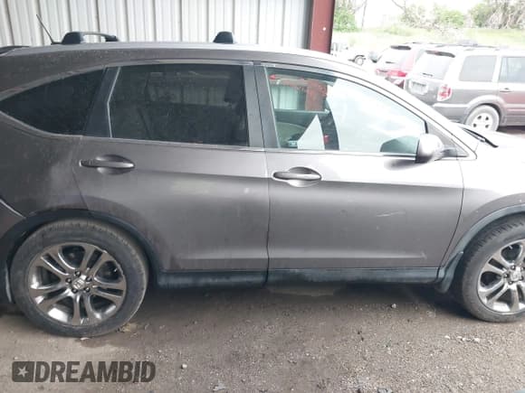 ✅ 2012 Honda CR-V EX-L • VIN: 5J6RM4H70CL022355 • Лот: 42299058. Опубликован ранее на IAAI с пробегом 99 679 миль. Бесплатный доступ к архиву аукционных продаж из США и подробный отчёт об истории автомобиля на DreamBid. Изображение 13.