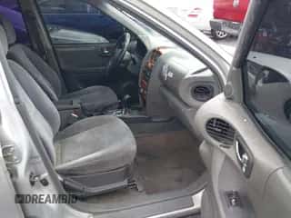 2002 Hyundai Santa Fe GLS z VIN KM8SC13D62U322962, wystawiony jako IAAI lot #41437333 z przebiegiem 183 711 mil mil oraz . Historia ofert i sprzedaży dostępna na DreamBid. Obrazek 5.