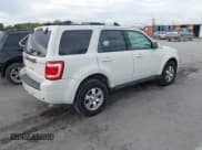 ✅ 2009 Ford Escape Limited • VIN: 1FMCU04GX9KA16180 • Lot: 43486908. Listed on IAAI with 133,848 mi. Free auction sales archive from the USA and detailed vehicle history report at DreamBid. Image 4.