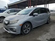 ✅ 2018 Honda Odyssey Elite • VIN: 5FNRL6H94JB013762 • Lot: 60725905. Listed on Copart with 98,286 mi. Free auction sales archive from the USA and detailed vehicle history report at DreamBid. Image 1.