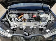 ✅ 2025 BMW iX xDrive50 • VIN: WB523CF00SCU13476 • Лот: 68222205. Опубликован ранее на Copart с пробегом 1 220 миль. Бесплатный доступ к архиву аукционных продаж из США и подробный отчёт об истории автомобиля на DreamBid. Изображение 11.