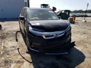 ✅ 2020 Honda Pilot Touring 7-Passenger • VIN: 5FNYF5H65LB009516 • Lot: 81001735. Listed on Copart with 66,757 mi. Free auction sales archive from the USA and detailed vehicle history report at DreamBid. Image 14.