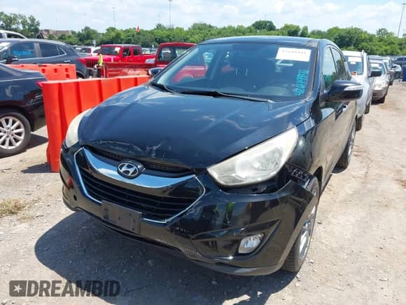 2010 Hyundai Tucson GLS with VIN KM8JUCACXAU067990, listed as a IAAI auction lot 42649941 with 171,324 mi miles and . Bid and sale history available at DreamBid. Image 6.