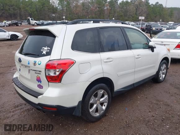 ✅ 2014 Subaru Forester Touring • VIN: JF2SJAPC5EH425252 • Lot: 43847572. Listed on IAAI with 213,349 mi. Free auction sales archive from the USA and detailed vehicle history report at DreamBid. Image 4.
