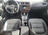 ✅ 2014 Volkswagen Jetta SE • VIN: 3VWD17AJ7EM315524 • Лот: 93297115. Опубликован ранее на Copart с пробегом 192 777 миль. Бесплатный доступ к архиву аукционных продаж из США и подробный отчёт об истории автомобиля на DreamBid. Изображение 8.