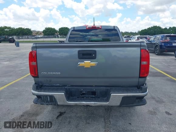 ✅ 2018 Chevrolet Colorado 2WD Work Truck • VIN: 1GCHSBEA0J1116952 • Lot: 42975442. Listed on IAAI with 94,400 mi. Free auction sales archive from the USA and detailed vehicle history report at DreamBid. Image 16.