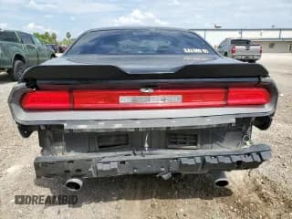 ✅ 2013 Dodge Challenger SXT Plus • VIN: 2C3CDYAG8DH724987 • Lot: 74142464. Wystawiony na Copart z przebiegiem 183 948 mil. Bezpłatny archiwum sprzedaży aukcyjnych z USA i szczegółowy raport historii pojazdu na DreamBid. Zdjęcie 6.