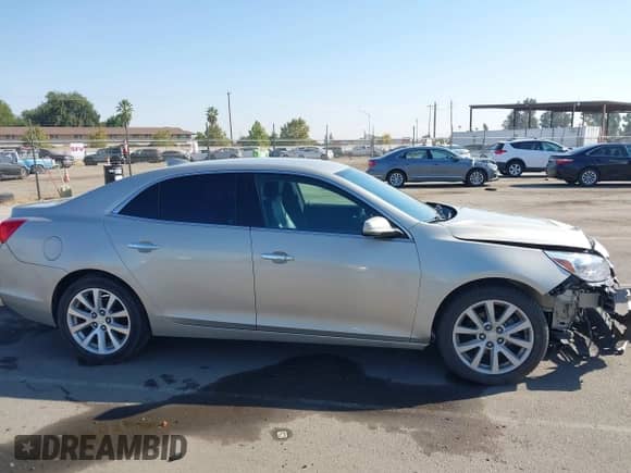 2016 Chevrolet Malibu LTZ z VIN 1G11E5SAXGF105153, wystawiony jako IAAI lot #43159960 z przebiegiem 145 269 mil mil oraz . Historia ofert i sprzedaży dostępna na DreamBid. Obrazek 14.