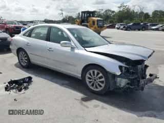 2007 Hyundai Azera SE z VIN KMHFC46F27A242907, wystawiony jako Copart lot #75424854 z przebiegiem 151 576 mil mil oraz Szkoda całkowita • Salvage title. Historia ofert i sprzedaży dostępna na DreamBid. Obrazek 4.