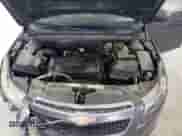 2011 Chevrolet Cruze LS z VIN 1G1PC5SH2B7185726, wystawiony jako Copart lot #71673065 z przebiegiem 229 657 mil mil oraz Szkoda całkowita • Salvage title. Historia ofert i sprzedaży dostępna na DreamBid. Obrazek 11.