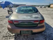 ✅ 1999 Ford Taurus SE • VIN: 1FAFP53S8XA285749 • Lot: 82766355. Wystawiony na Copart z przebiegiem 114 880 mil. Bezpłatny archiwum sprzedaży aukcyjnych z USA i szczegółowy raport historii pojazdu na DreamBid. Zdjęcie 6.