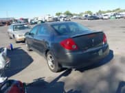 ✅ 2006 Pontiac G6 GT • VIN: 1G2ZH558864109212 • Lot: 43285183. Listed on IAAI with 205,495 mi. Free auction sales archive from the USA and detailed vehicle history report at DreamBid. Image 3.