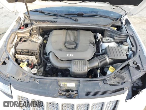 ✅ 2015 Jeep Grand Cherokee Summit • VIN: 1C4RJEJG0FC118974 • Lot: 49002165. Listed on Copart with 112,463 mi. Free auction sales archive from the USA and detailed vehicle history report at DreamBid. Image 12.