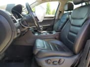 ✅ 2013 Volkswagen Touareg Lux • VIN: WVGEF9BP0DD001565 • Lot: 63070845. Listed on Copart with 123,788 mi. Free auction sales archive from the USA and detailed vehicle history report at DreamBid. Image 7.